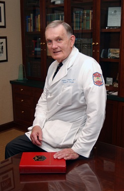 Dr. James L. Hughes